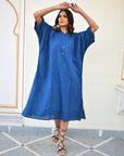 "Make a statement in our gorgeous blue long shirt dress. Effortless style, maximum impact. Shop yours today!"