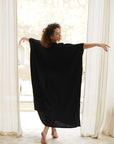 Indulge in comfort and style with our black cotton gauze kaftan. Perfect for any occasion.