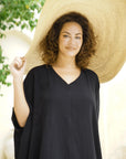 Discover timeless elegance in our black cotton gauze kaftan. Effortlessly chic and comfortable. Shop now!