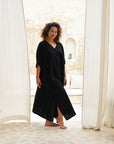 Elevate your wardrobe with our black cotton gauze kaftan. Effortless sophistication in every stitch.