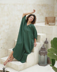 Step into sophistication with our Forest Green Cotton Gauze Long Kaftan. Effortless style, unmatched comfort. Buy now!
