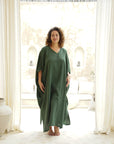 Experience unparalleled comfort in our Forest Green Cotton Gauze Long Kaftan. Embrace relaxation with every wear. Shop today!