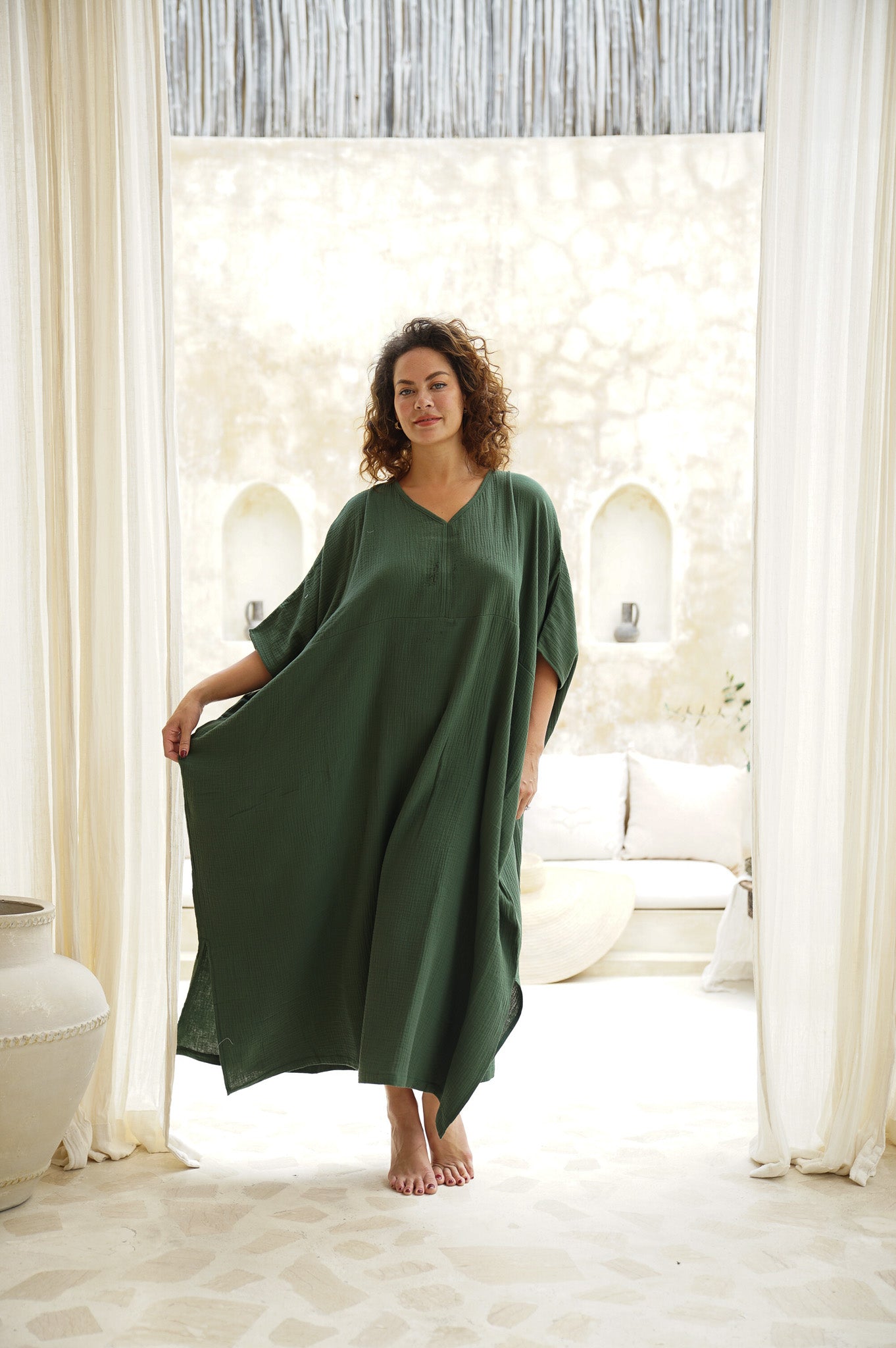 Experience unparalleled comfort in our Forest Green Cotton Gauze Long Kaftan. Embrace relaxation with every wear. Shop today!