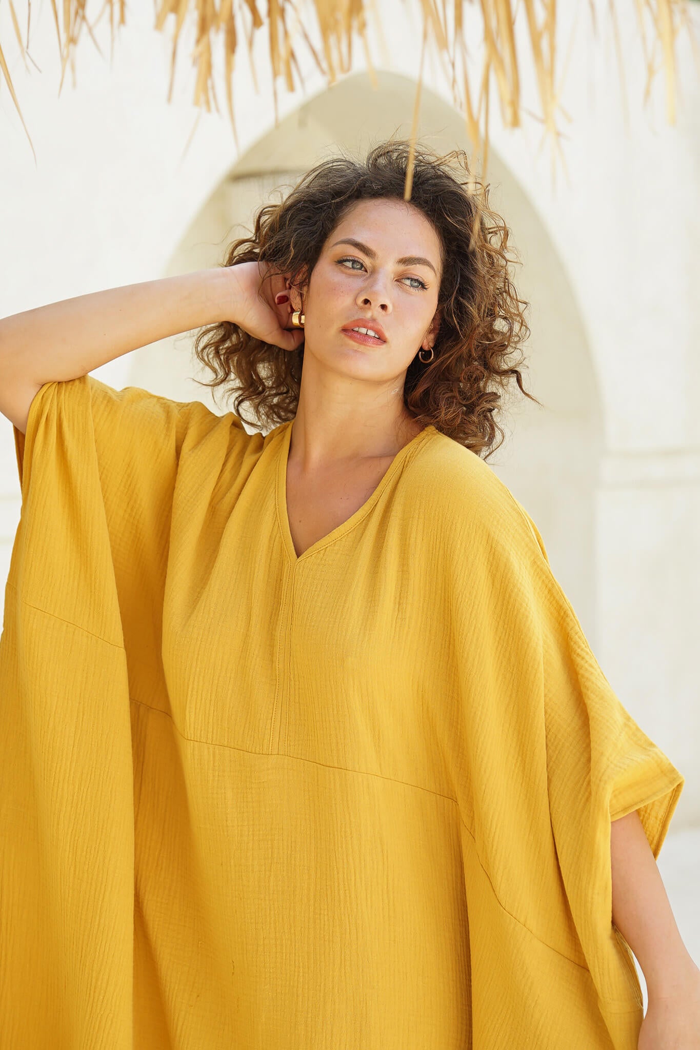 Wrap yourself in luxury with our mustard long kaftan. Soft cotton, breezy elegance. Discover yours today!