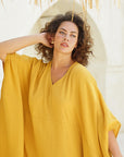 Wrap yourself in luxury with our mustard long kaftan. Soft cotton, breezy elegance. Discover yours today!