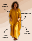 Flowy mustard-colored cotton gauze kaftan with a relaxed fit, perfect for a breezy, casual look.