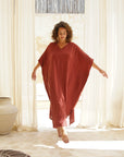 Discover the allure of our Rust Cotton Gauze Kaftan. Embrace effortless sophistication. Shop now!