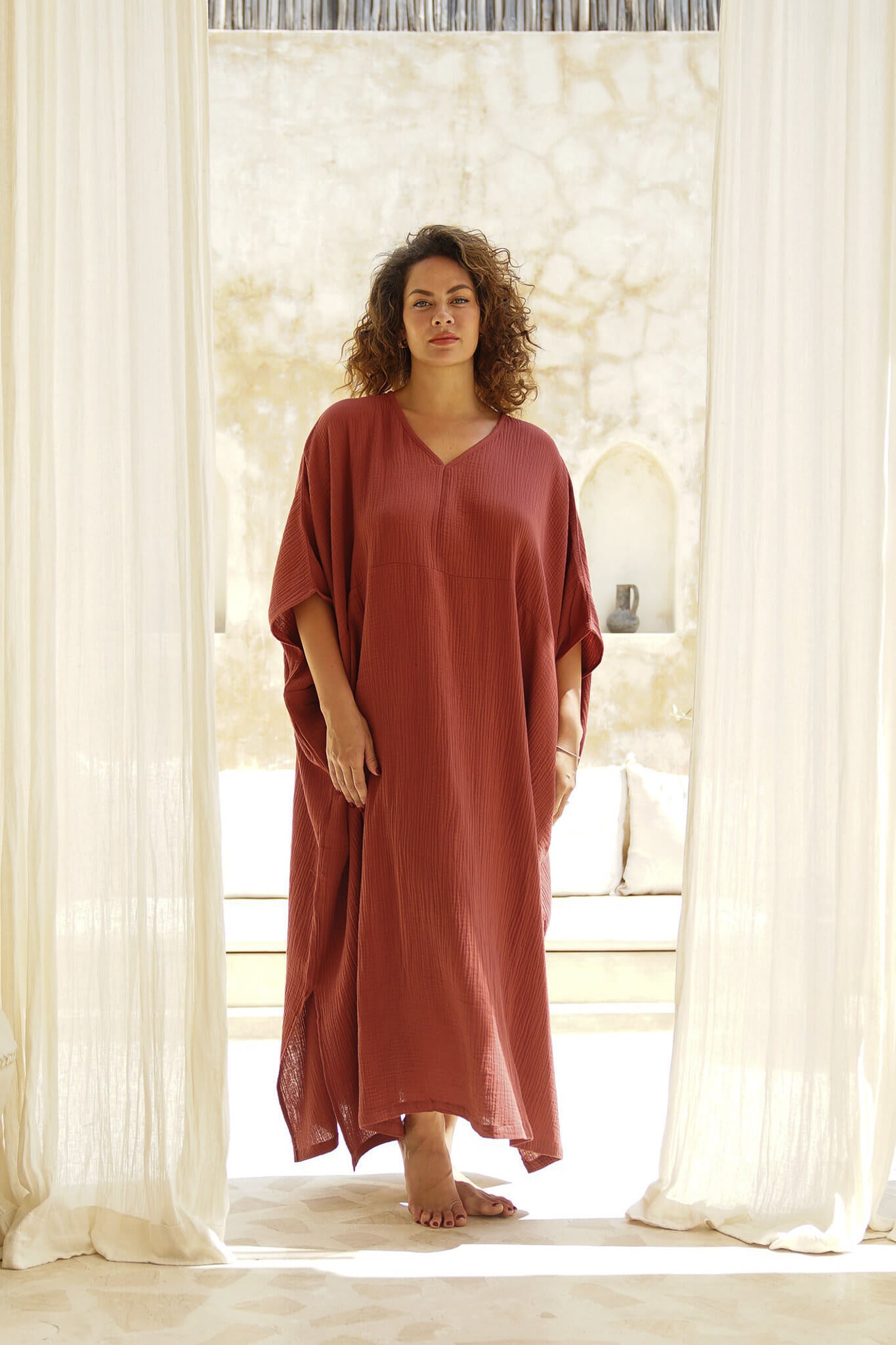 Effortless style meets ultimate comfort. Shop our Rust Cotton Gauze Long Kaftan now. Your new wardrobe essential!
