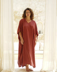 Effortless style meets ultimate comfort. Shop our Rust Cotton Gauze Long Kaftan now. Your new wardrobe essential!
