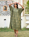 "Handmade cotton shirt dress in green and gold: Unique artisanal creation, perfect for standout style."