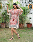 "Cotton short kaftan in leopard print: Handcrafted for unique charm and trendy elegance."