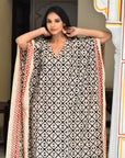 "Eco-conscious cotton kaftan: Long silhouette ensures eco-friendly elegance and comfort."