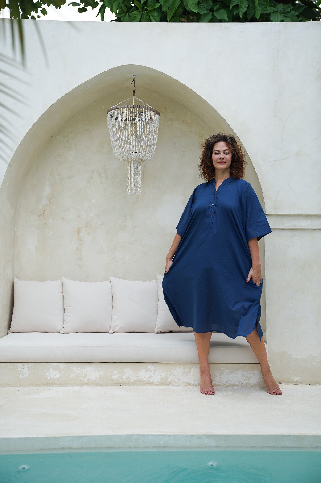 "Step out in style with our elegant blue long shirt dress. Flattering fit, timeless appeal. Shop the look now!"