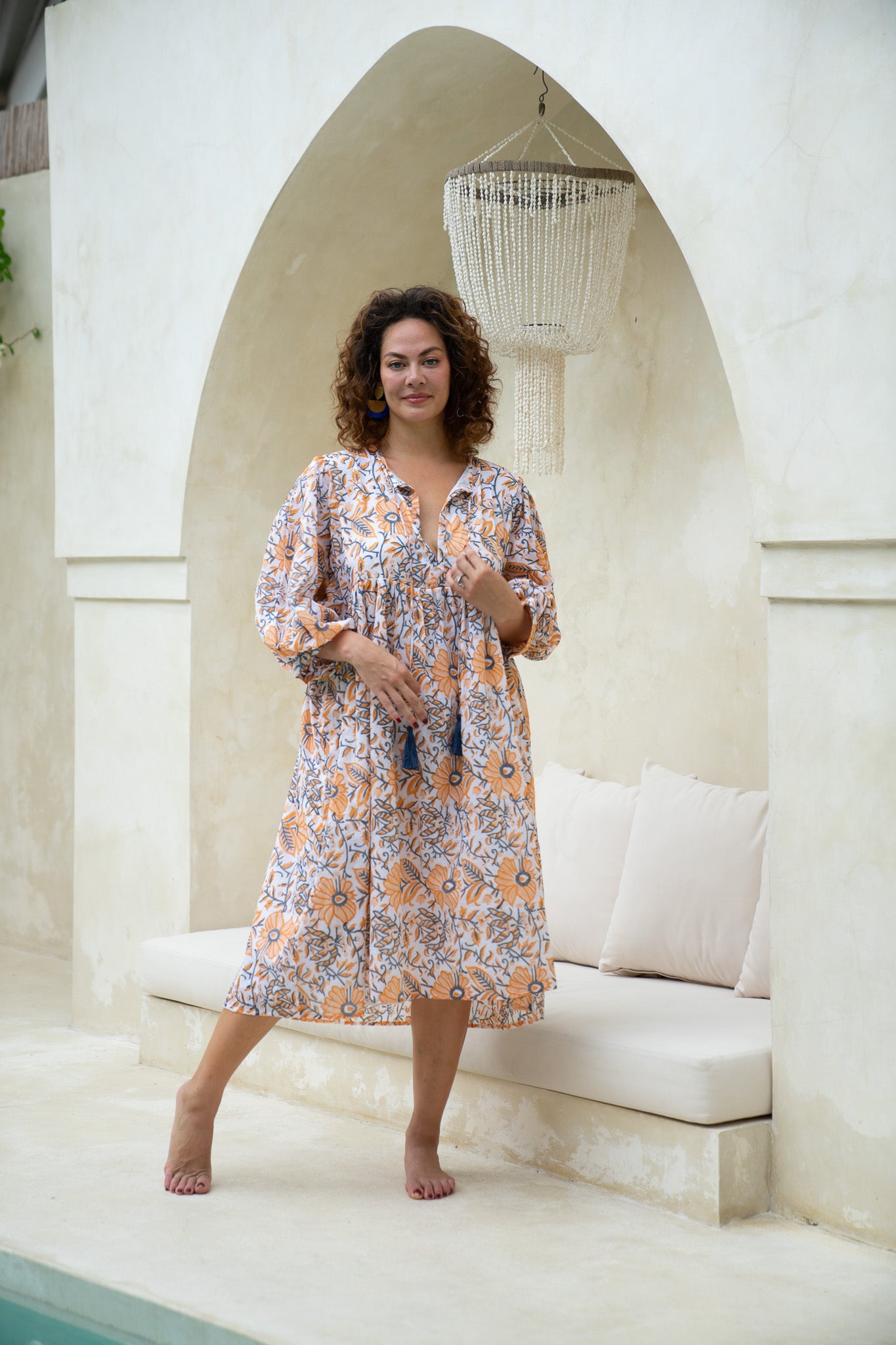 Wrap yourself in floral charm with our cotton midi dress. Experience effortless allure with every wear!