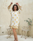 "Turn heads in our radiant yellow floral short dress. Effortlessly chic for any occasion. Shop now!"
