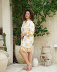 Stand out in a sea of fashion with our yellow floral short dress. Simply stunning!
