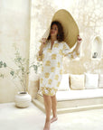 Floral long-sleeved cotton midi dress: Perfect blend of comfort and sophistication."