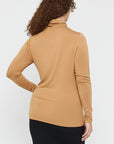 "Bamboo women's turtle neck top: Stay chic and comfortable in beige, crafted from buttery soft fabric."