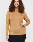 "Buttery soft bamboo women's top in beige: Sustainable fashion with a touch of elegance and comfort."
