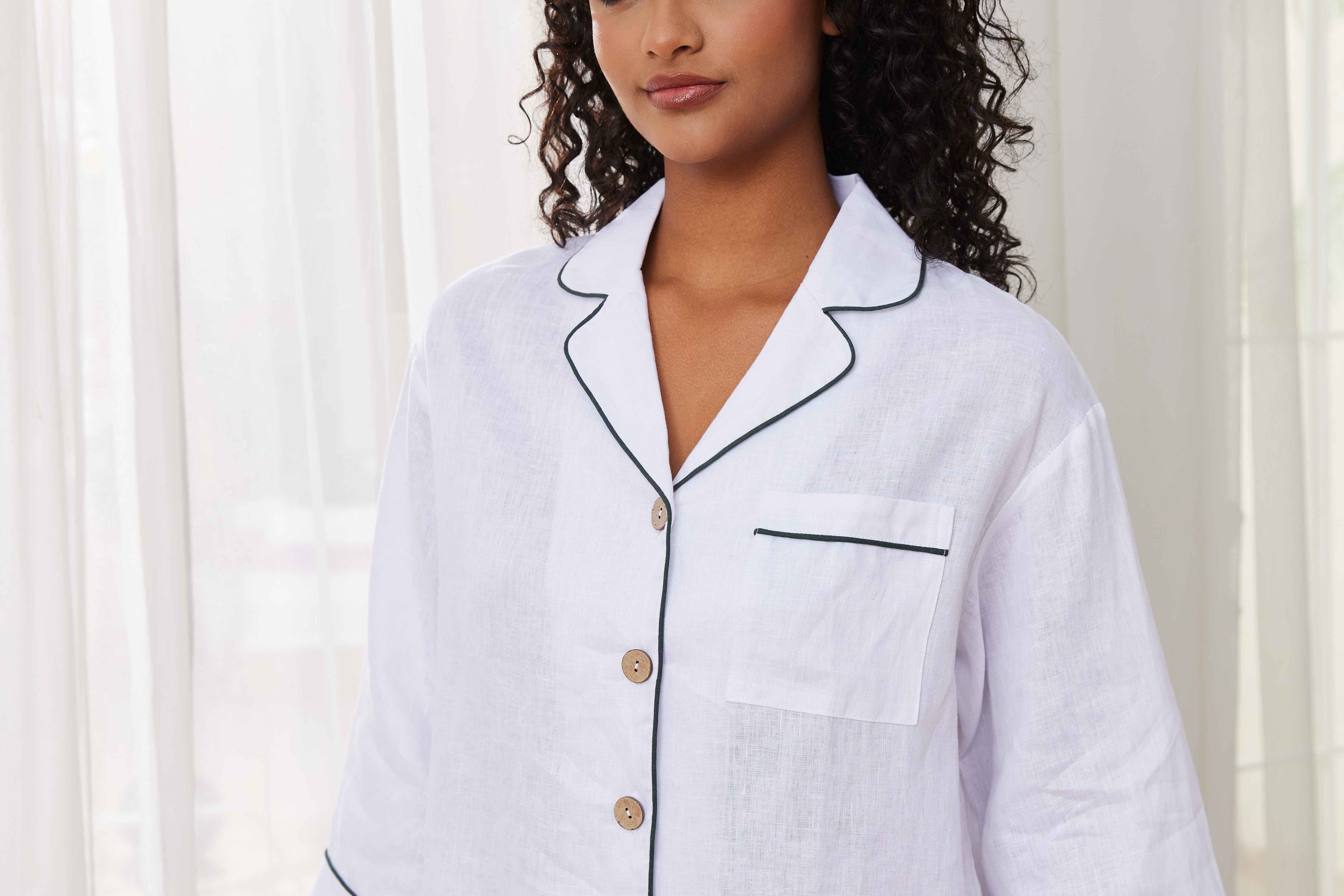 "White linen perfection: Elevate your sleep experience with these elegant women's pajamas made from high-quality linen fabric."