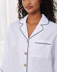 "White linen perfection: Elevate your sleep experience with these elegant women's pajamas made from high-quality linen fabric."