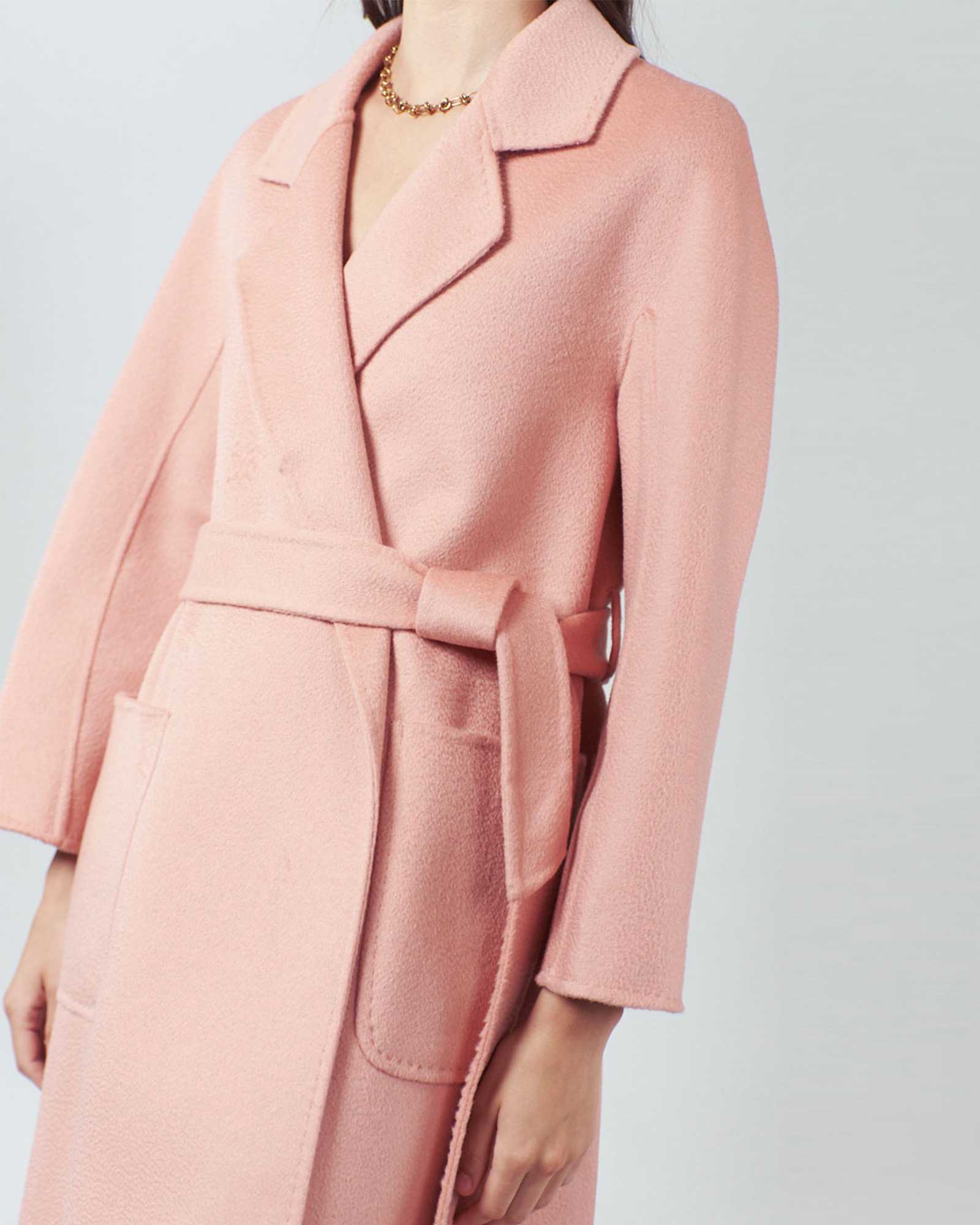 Embrace sophistication in our Pink Blush Wool Coat. Effortless elegance for every occasion.