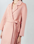 Embrace sophistication in our Pink Blush Wool Coat. Effortless elegance for every occasion.