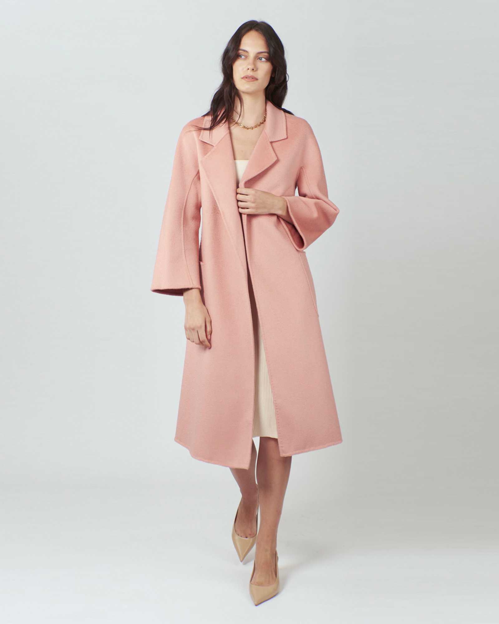 Indulge in elegance with our Pink Blush Luxe Wool Coat. Stay warm in style. Order yours today!