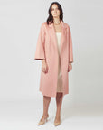 Wrap yourself in luxury with our Pink Blush Wool Coat. Elevate your style effortlessly. Shop now!