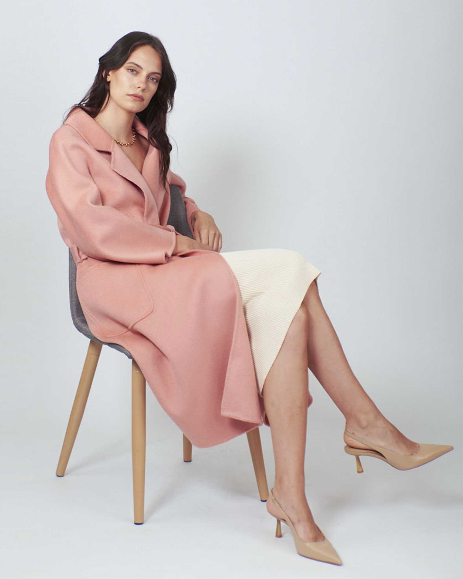 Discover the epitome of style in our Pink Blush Luxe Wool Coat. Luxurious comfort, unmatched grace.