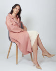 Discover the epitome of style in our Pink Blush Luxe Wool Coat. Luxurious comfort, unmatched grace.