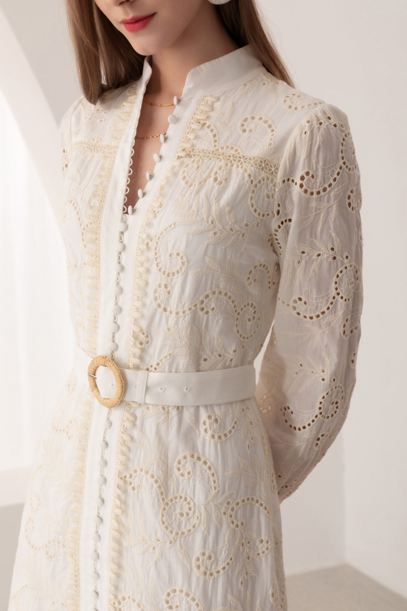 Step into elegance with our Embroidered White Cotton Midi Dress. Classic design, modern allure. Order now!