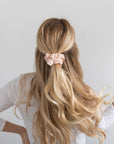 Achieve the perfect bun or ponytail with Kooshoo's versatile hair scrunchie. Eco-friendly fashion for every occasion.