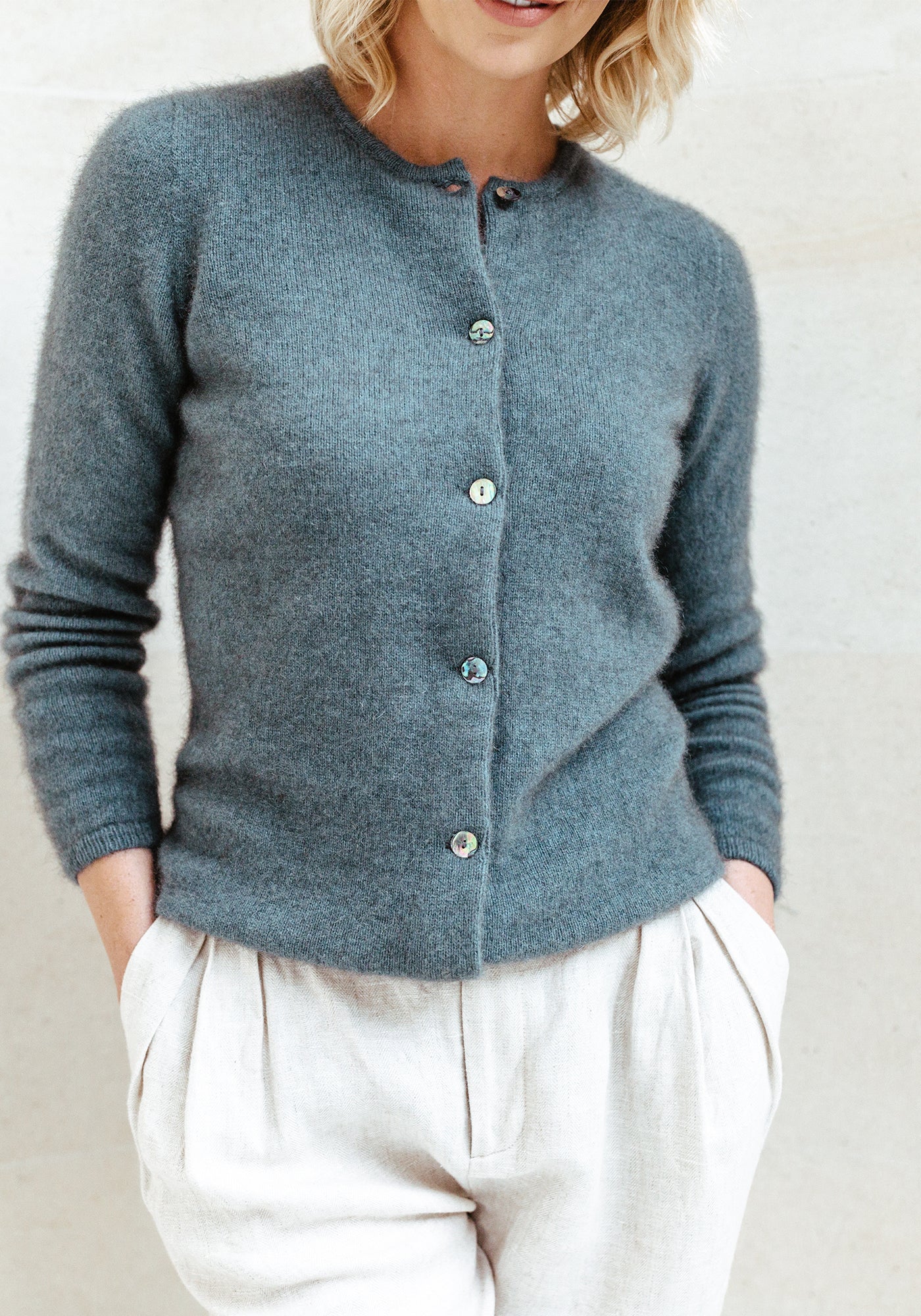 Unmatched quality: Pure Merino wool grey cardigan sweater, craftsmanship meets comfort. Shop the best now!