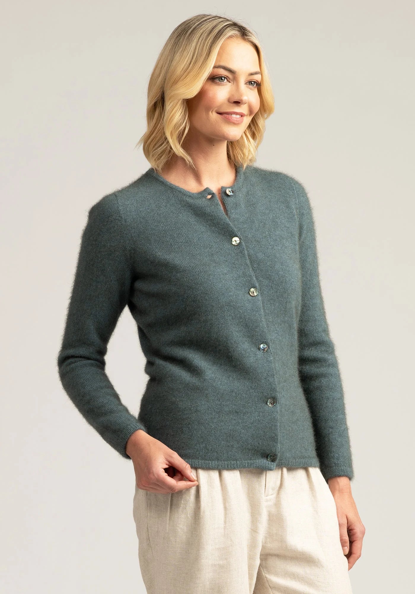 Effortless elegance: Pure Merino wool grey button up sweater, versatile, and irresistibly soft. Buy yours today!