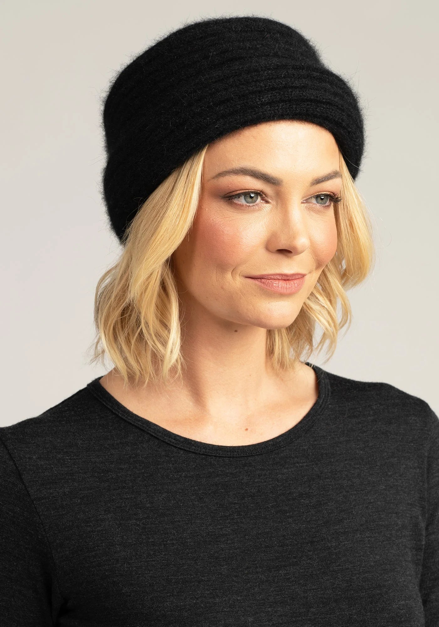 Stay cozy &amp; stylish with our black Merino knit hat. Soft, warm, &amp; versatile. Get yours now!