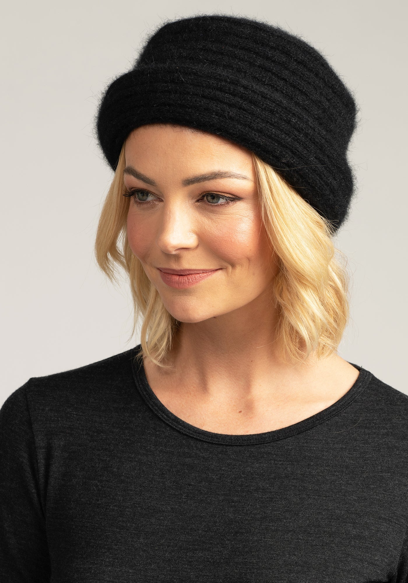 Elevate your winter style with our black Merino knit beanie. Premium warmth, timeless design.