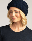 Wrap up in luxury with our navy blue Merino knit beanie. Fashion meets function in every stitch!
