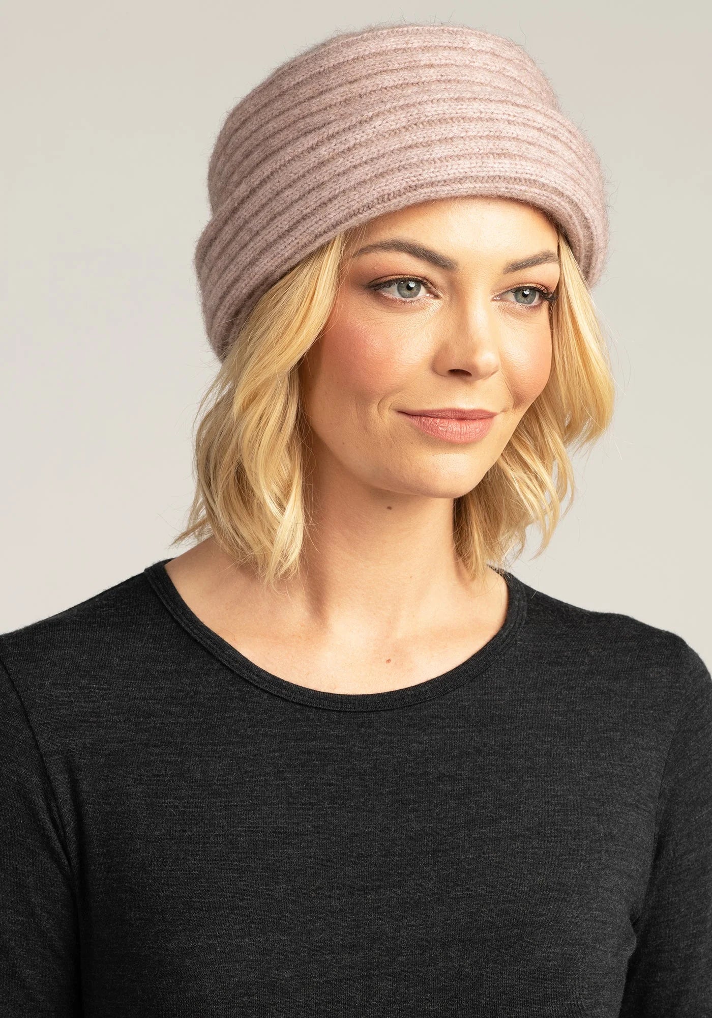 Stay cozy in style with our Merino Knit Hat. Soft, light pink beanie for warmth and fashion-forward flair. Shop now!