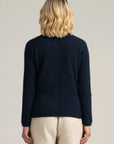 Our pure merino wool navy blue cardigan offers unparalleled comfort and style. Ideal for any season, any occasion. Shop now for premium quality!