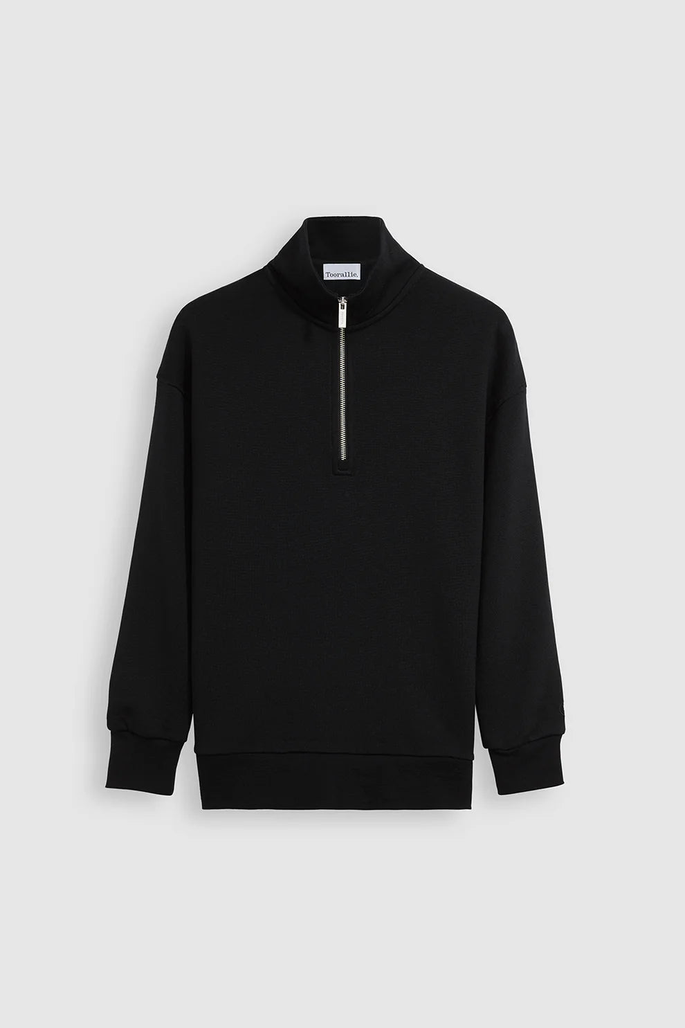 "Experience luxury like never before with our black Merino wool zip collar sweater. Unmatched softness, undeniable appeal."