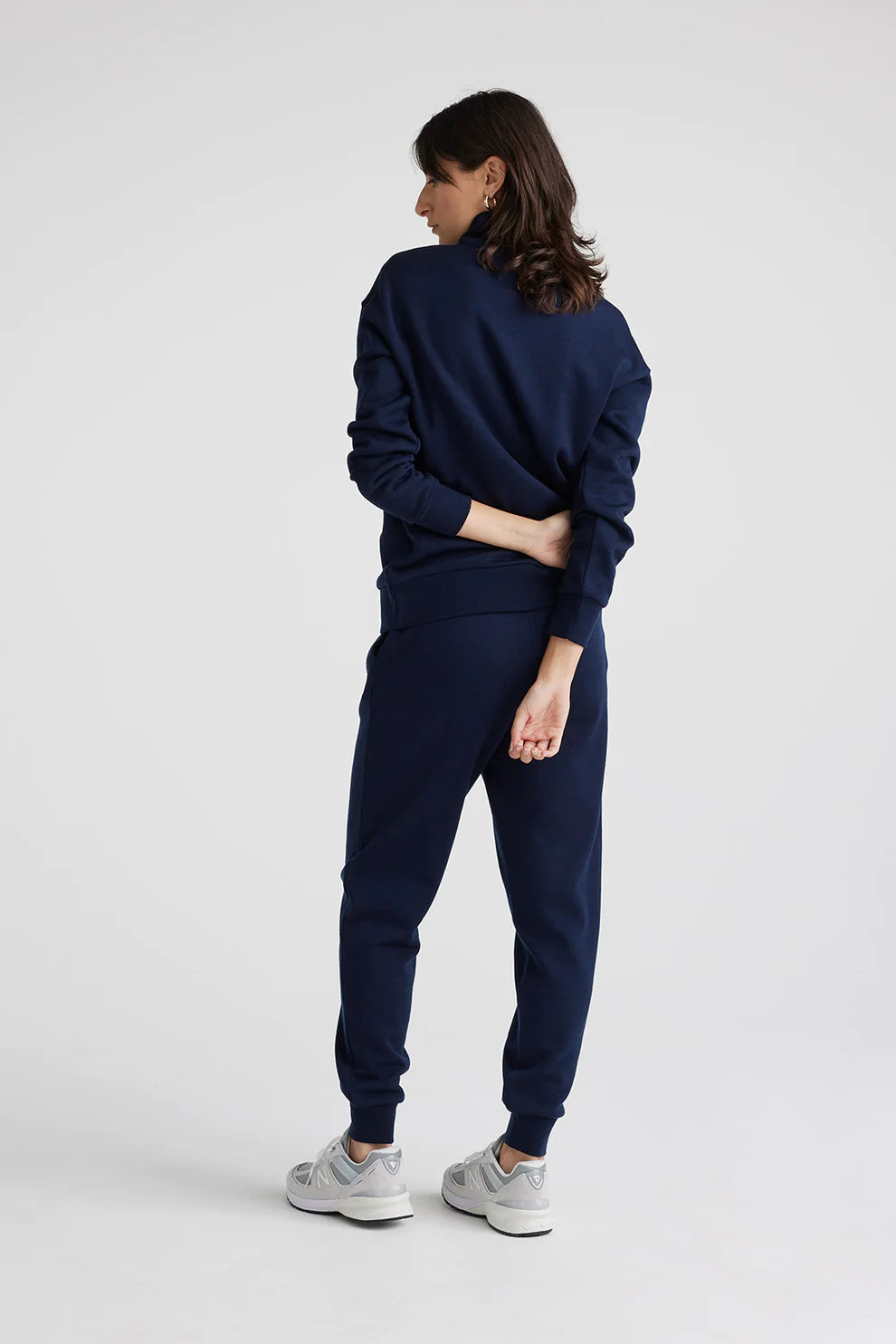 Wrap yourself in sophistication with our navy blue Merino wool sweater. Zip collar for a touch of modern flair.