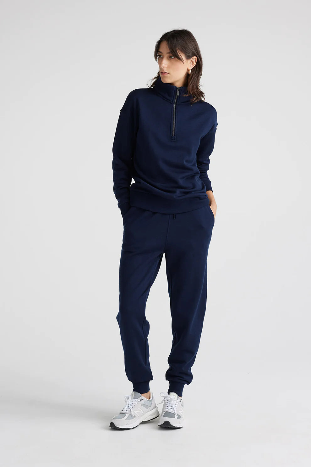 "Stay cozy in style with our navy blue Merino wool zip collar sweater. Luxurious comfort meets timeless sophistication."