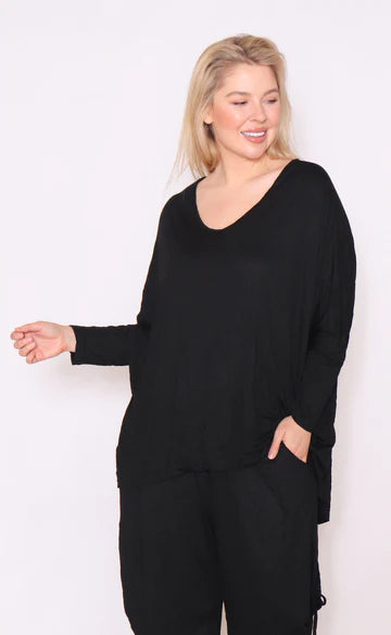 Embrace elegance with our must-have plus-size long sleeve black top. Comfortable, stylish, and versatile. Buy now!