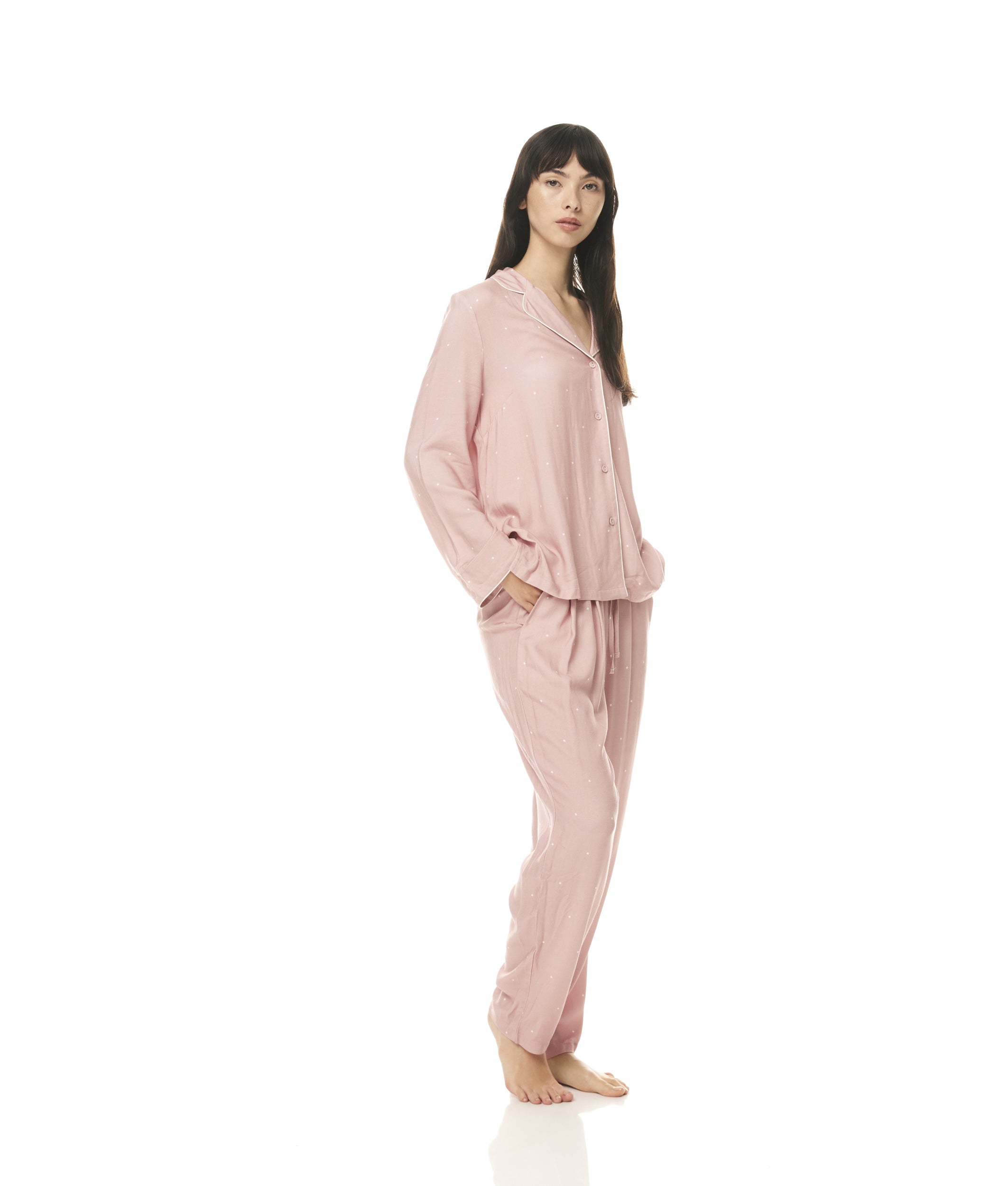 &quot;Sleep in style and sustainability with bamboo pajamas featuring playful pink polka dots. Shop now!&quot;