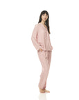 "Sleep in style and sustainability with bamboo pajamas featuring playful pink polka dots. Shop now!"