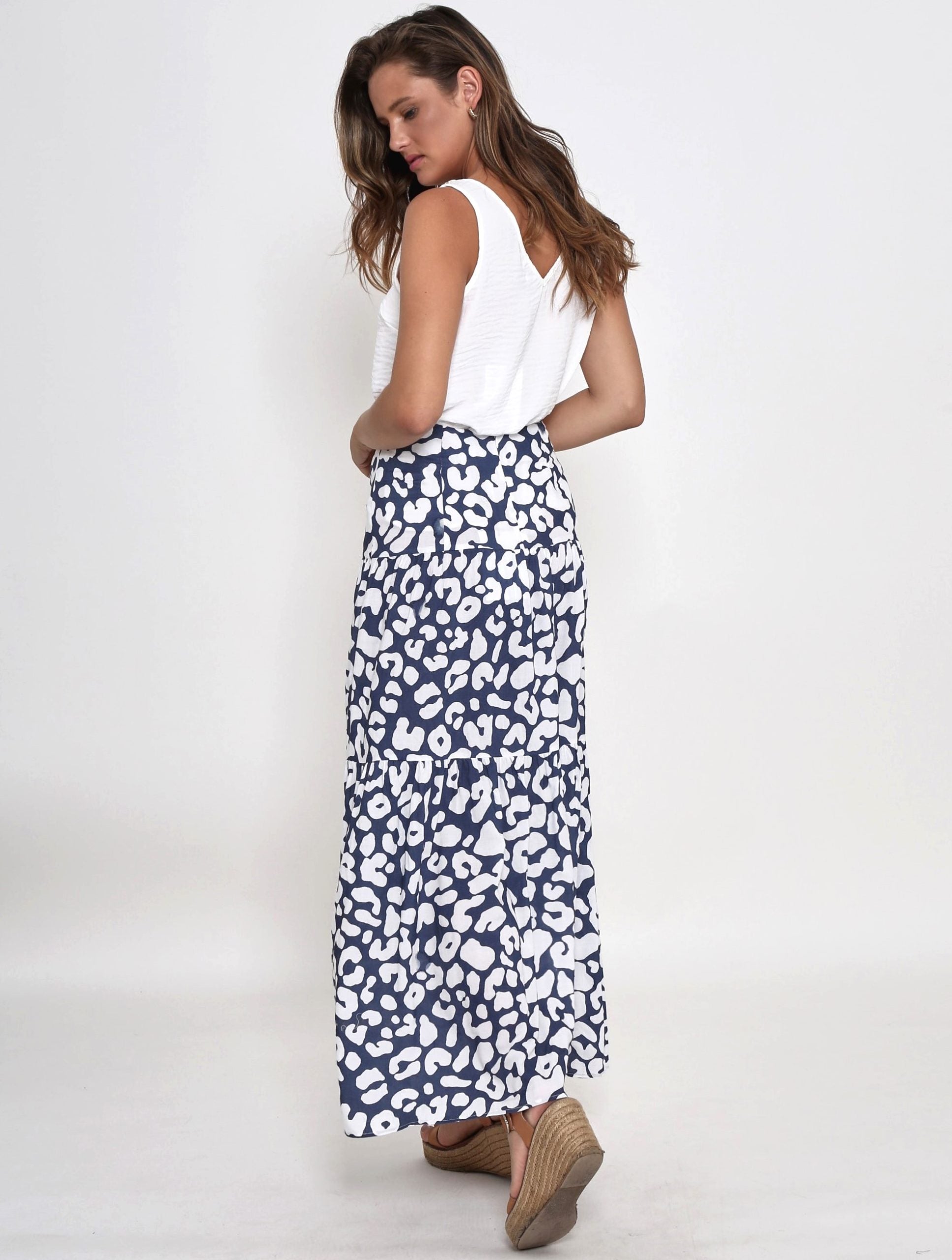 Experience ultimate style and comfort with our navy leopard print cotton long skirt. Perfect for any look, any occasion. Shop today and shine!