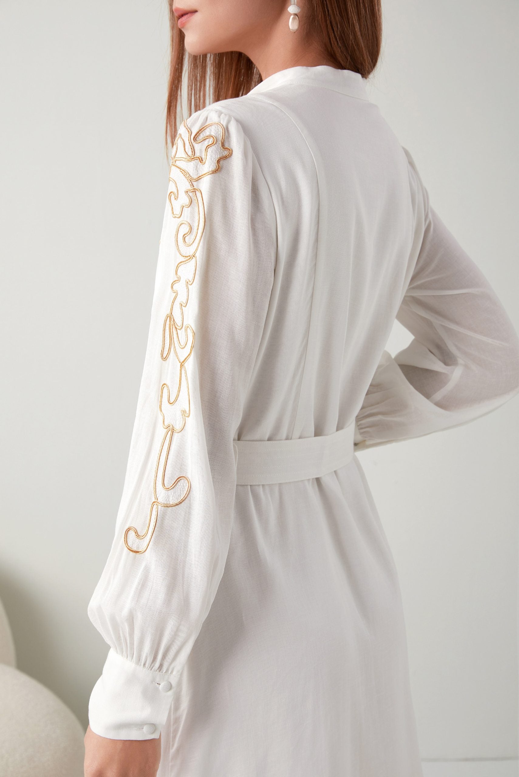 "Chic meets charm: Embroidered short white dress. Discover your perfect summer look!"