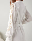 "Chic meets charm: Embroidered short white dress. Discover your perfect summer look!"