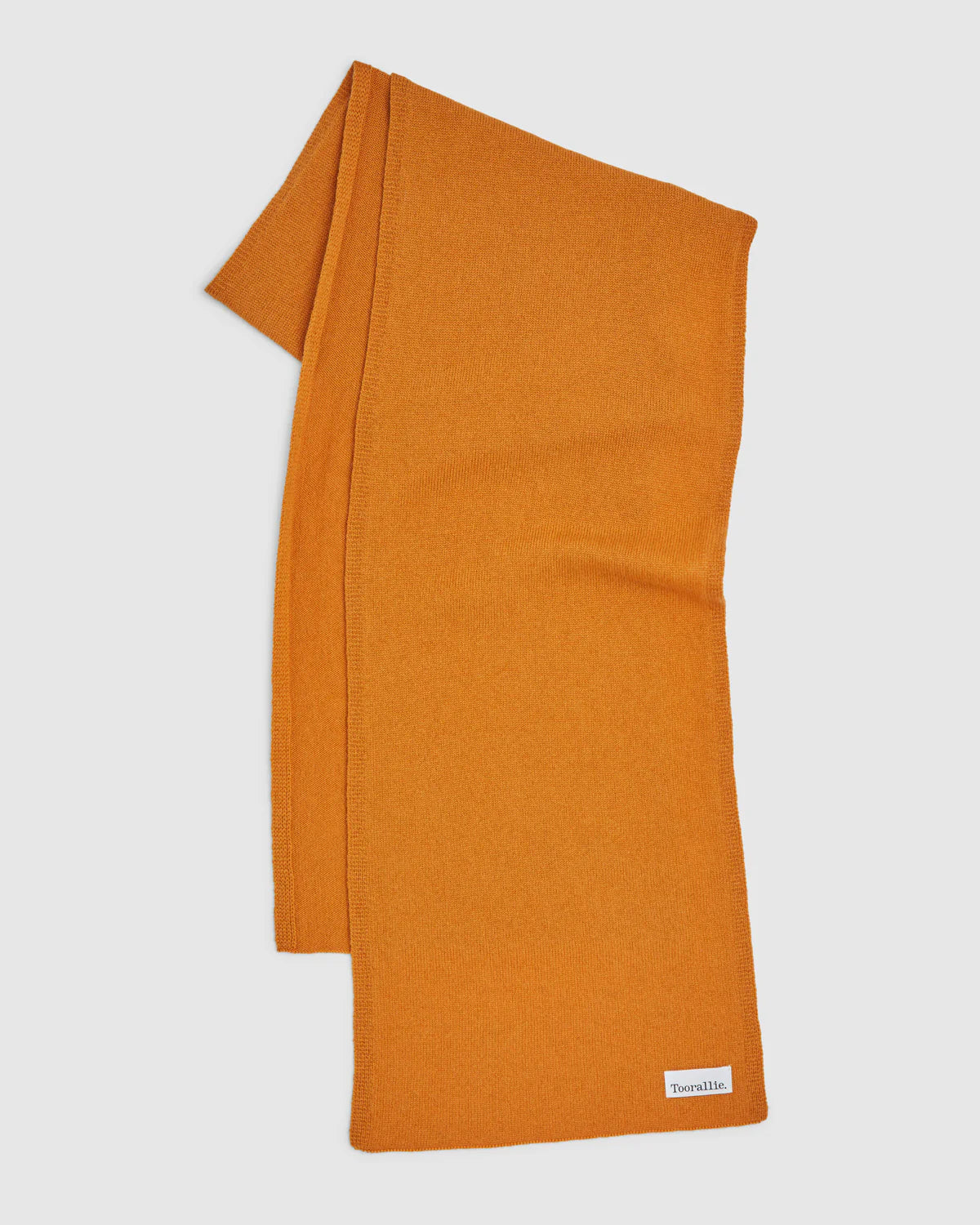 Wrap yourself in luxury with our Mandarin Merino Lambswool Scarf. Soft, stylish, and irresistibly warm. Shop now!